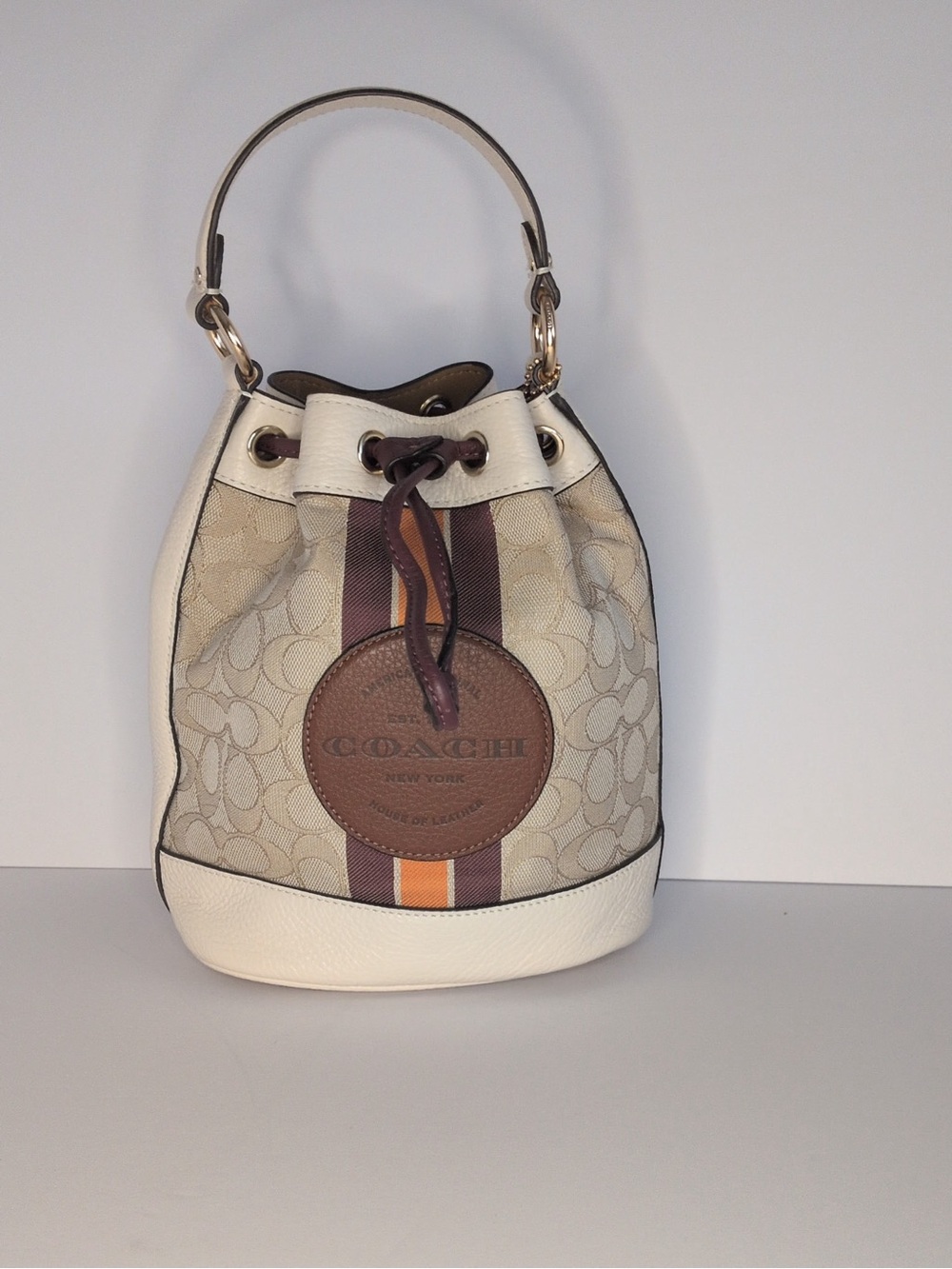 Coach Cream Canvas Mini Bucket Bag with Brown Patch and Purple & Yellow Stripes